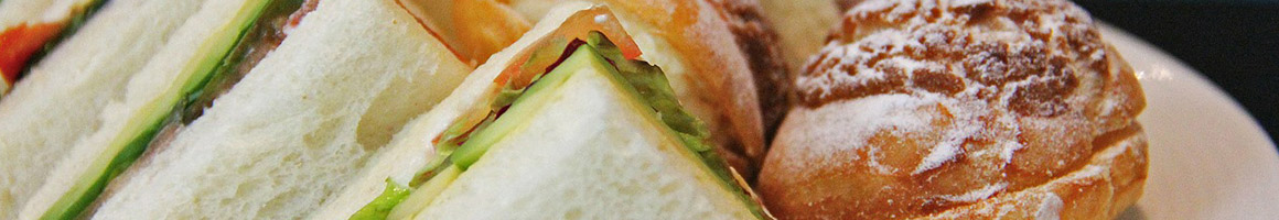Eating American (Traditional) Burger Deli Sandwich at Boar's Breath Grill restaurant in Port Hueneme, CA.